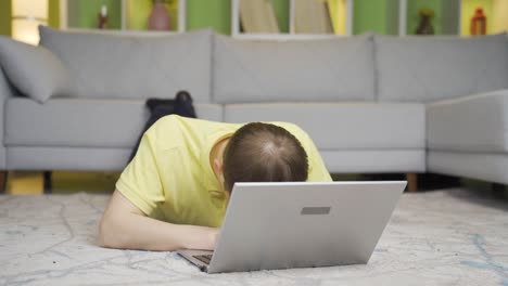 Young-man-using-depressed-laptop-at-home.