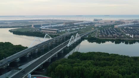 Aerial-view-of-the-PIK-riverfront-residential-developments-in-Jakarta-at-sunset