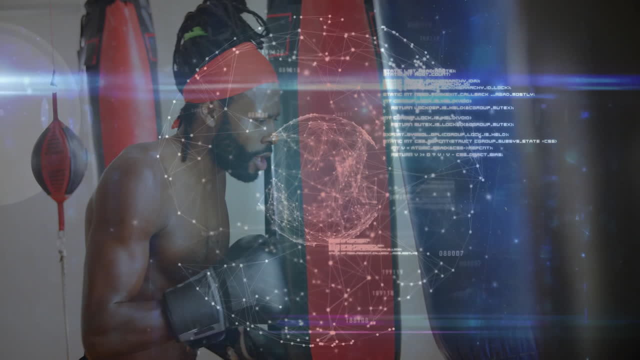 Male boxer punching bag in gym showing holographic tech network with data streams