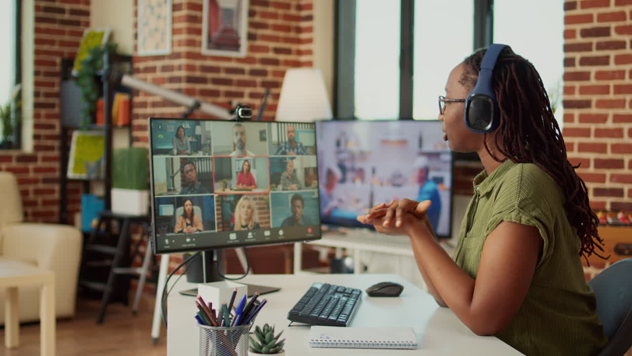 Office worker attending company meeting on videocall