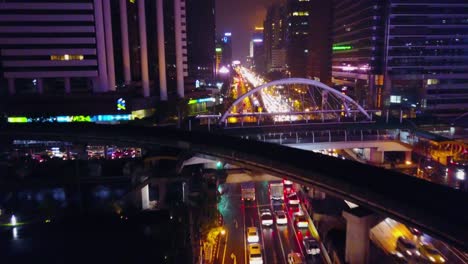 night traffic in a city with rain