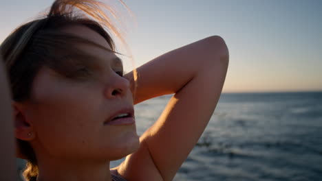 fitness, pregnant woman and relax by the beach