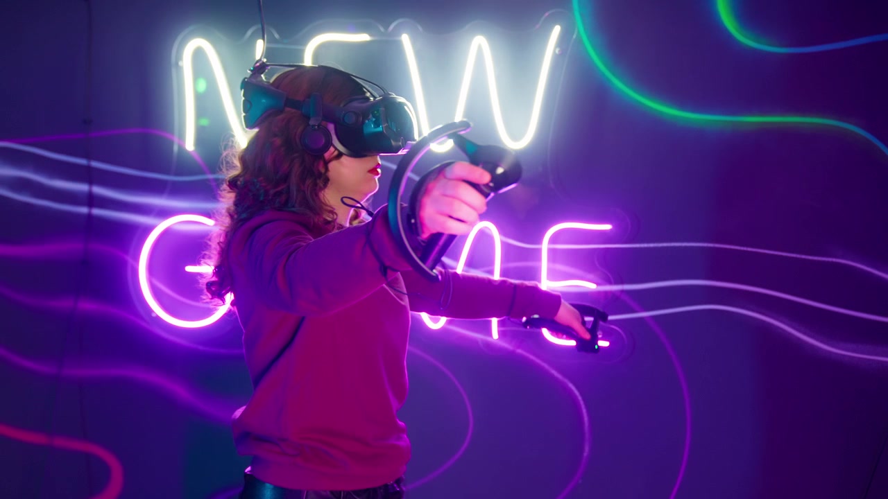 Young Woman Playing Virtual Reality Game in Neon Lit Room