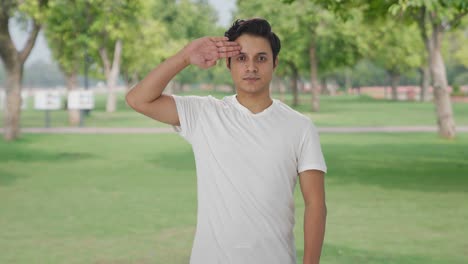 proud indian man saluting on camera