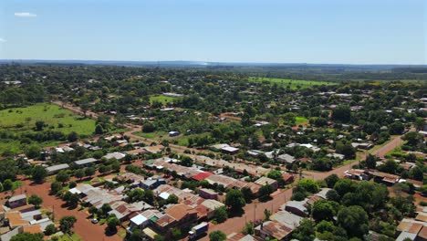 panoramic drone image revealing the small town of concepción de la sierra in misiones, argentina, showcasing its natural surroundings and quaint architecture.