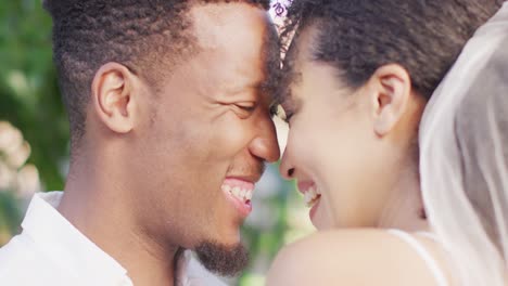 Close-up-of-happy-married-african-american-couple-smiling