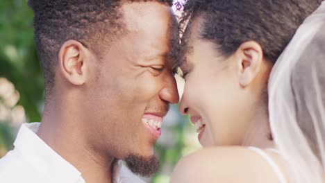 close up of happy married african american couple smiling