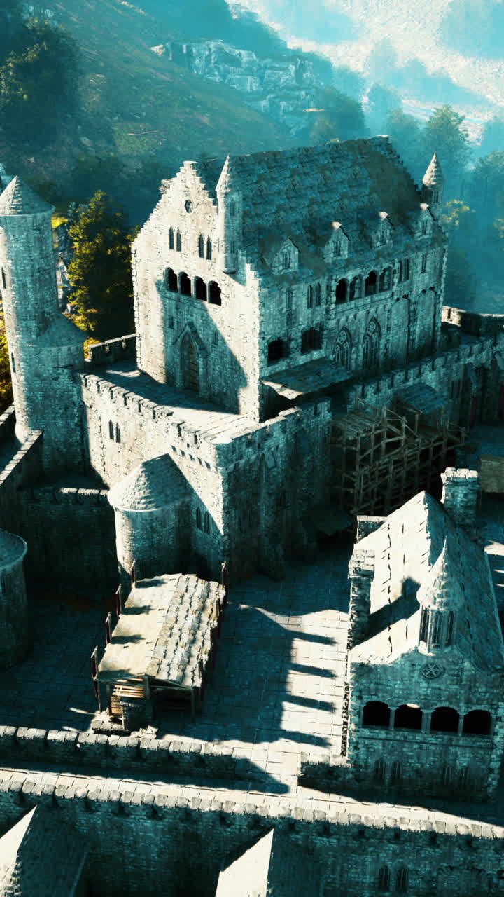 un gran castillo de piedra se encuentra en la cima de una colina con vistas a un valle. el castillo está rodeado por una pared y tiene una torre en el centro.