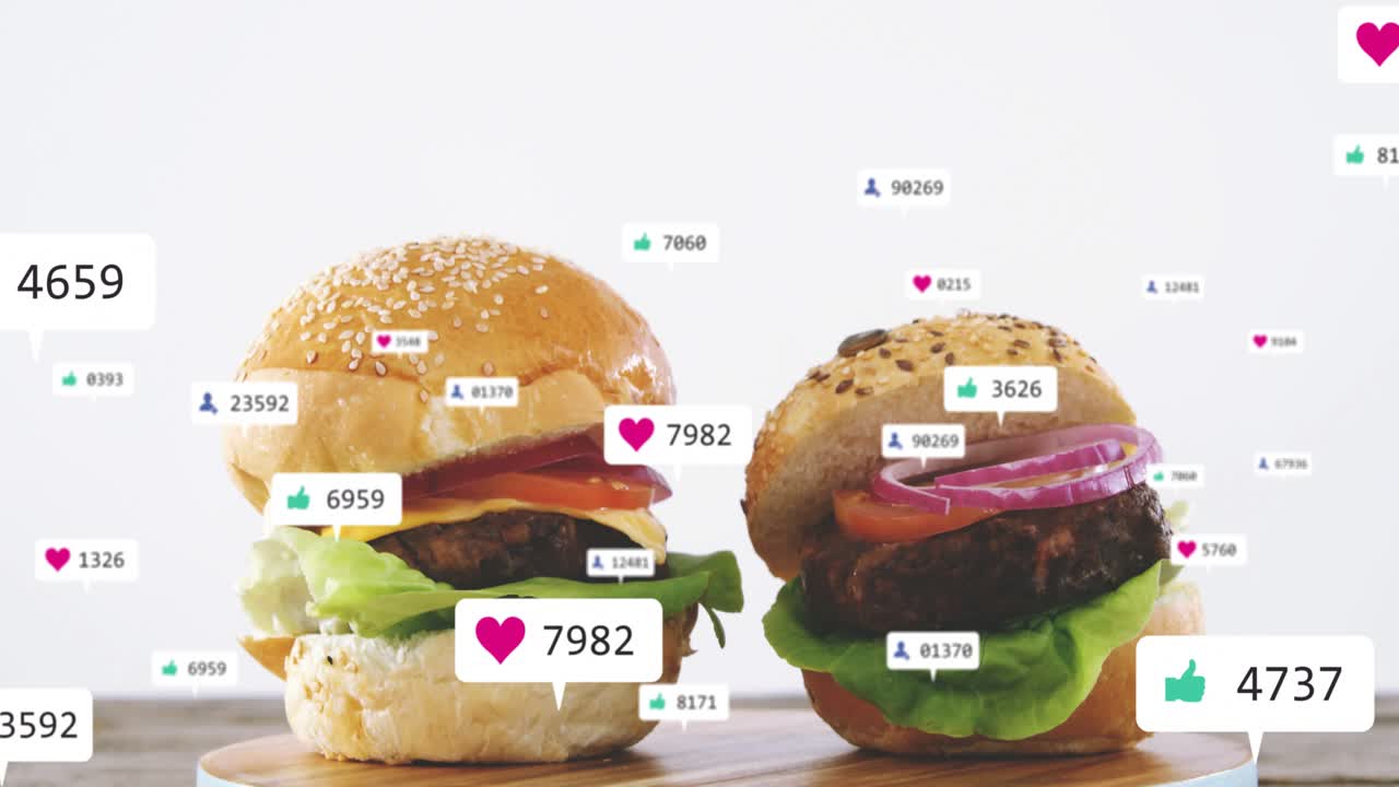 Two burgers resting on blue plate while camera moving down and marketing labels rising near buns
