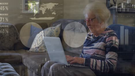 animation of statistical data processing against caucasian senior woman using laptop at home