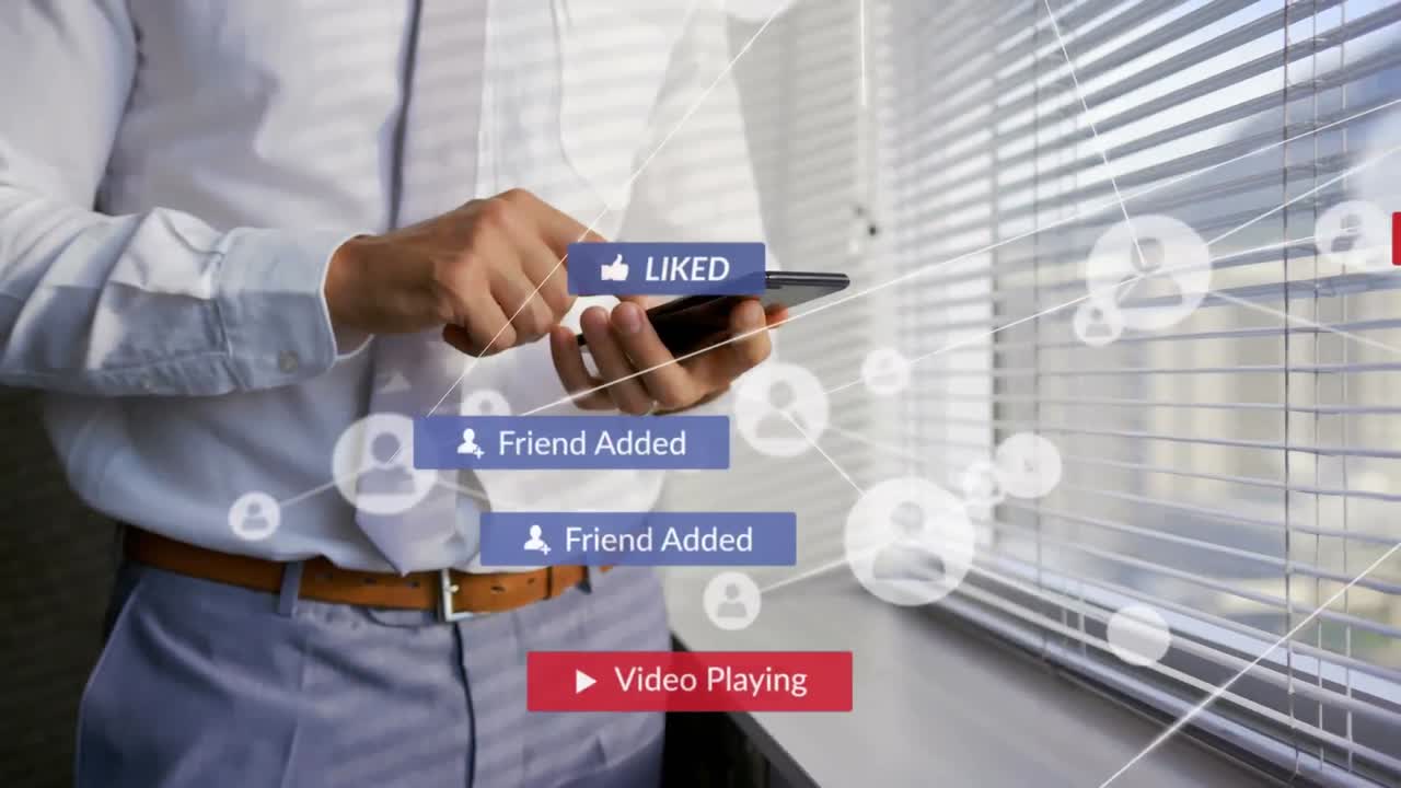 Animation of network of connetcions with icons over cuacasian man using smartphone