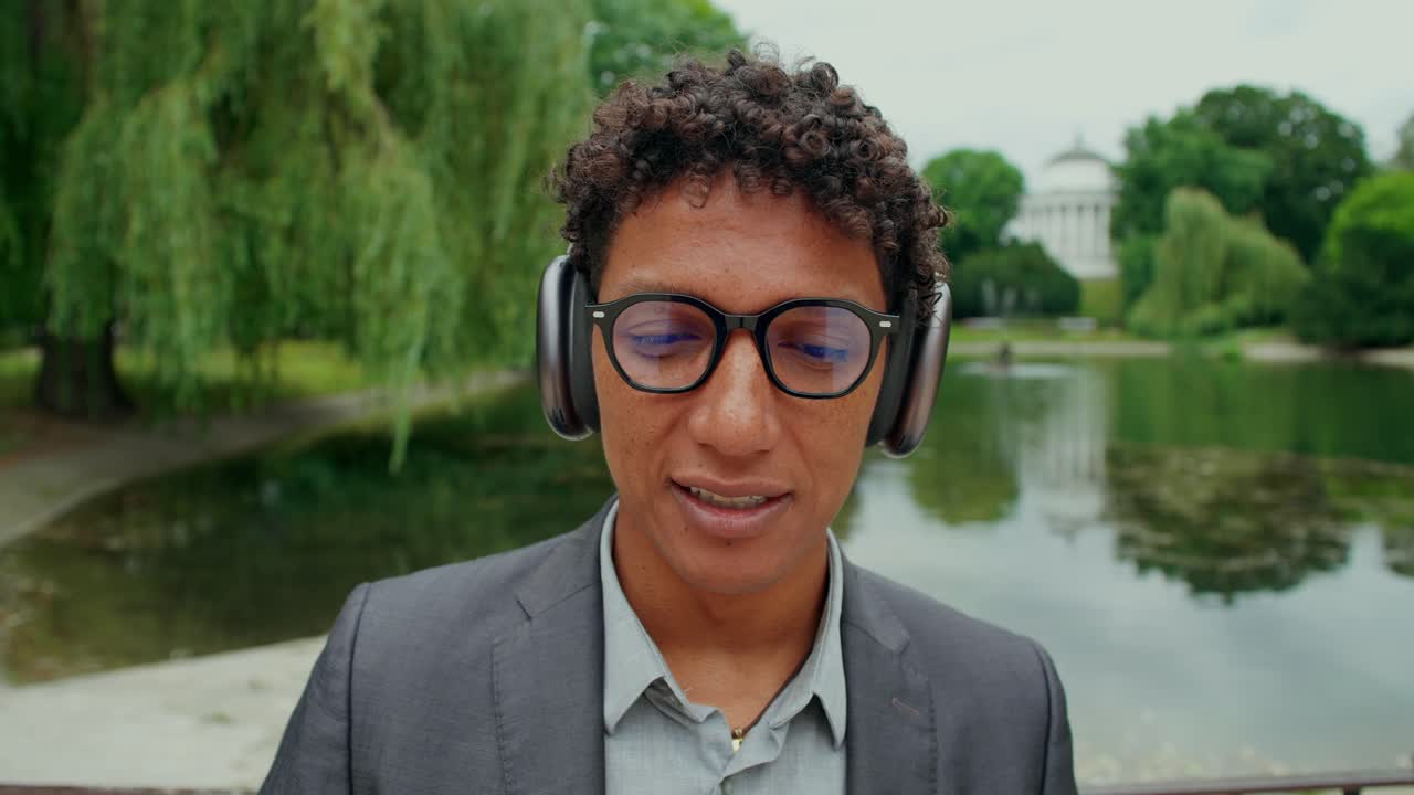 Man with Headphones in Park