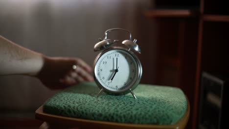 alarm clock on a stool