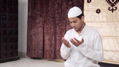 indian muslim man reading namaz and praying to allah