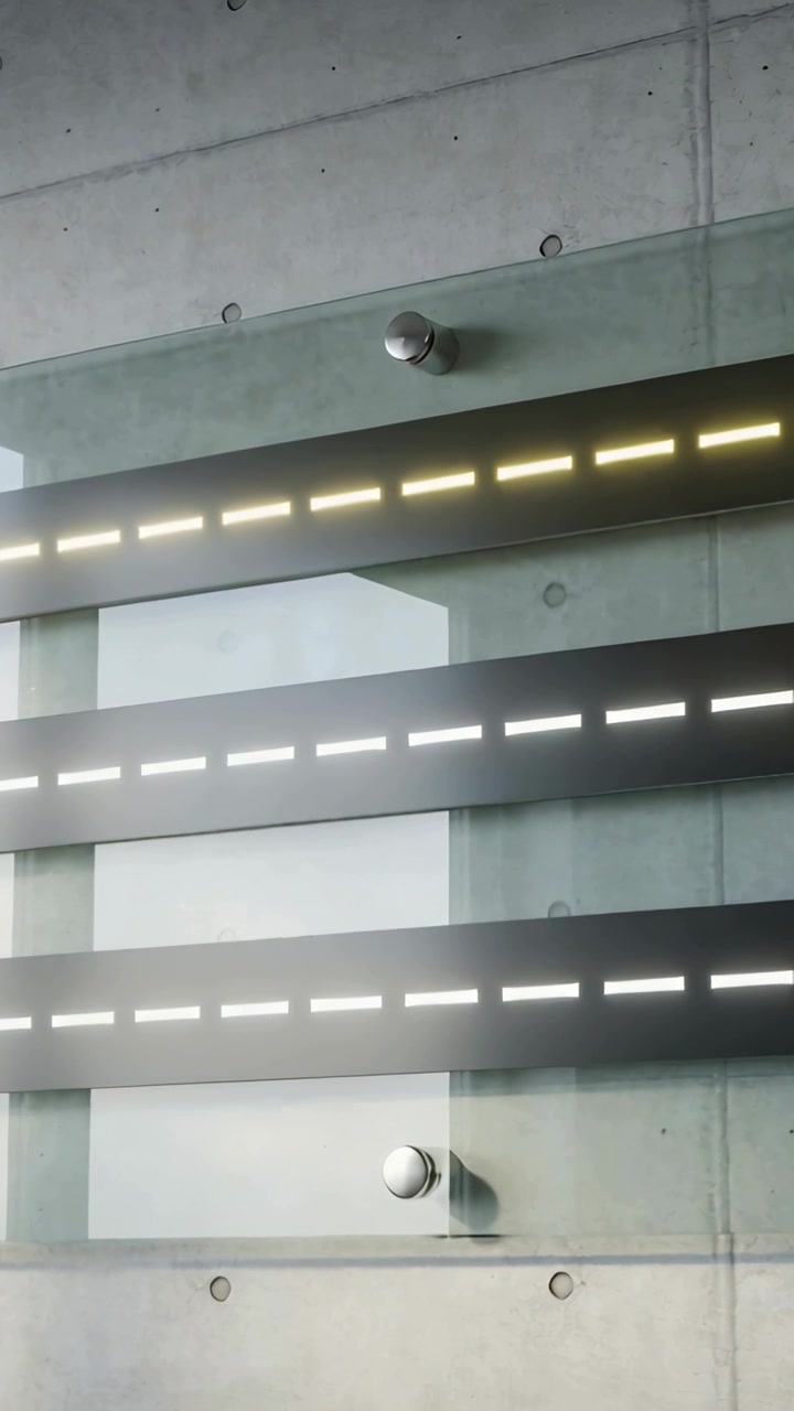Vertical video: Panning camera showing three slats in atrium, revealing fixtures, warm-cool light