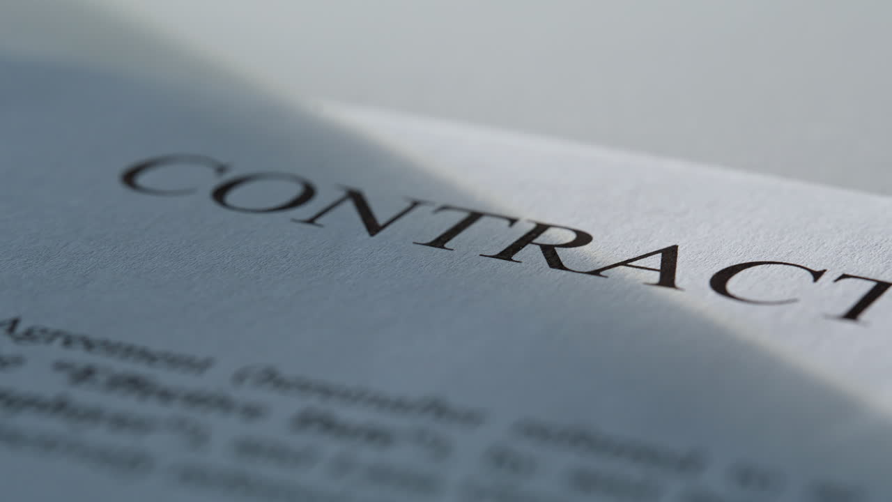 Closeup legal paperwork lying table surface. Official agreement form document