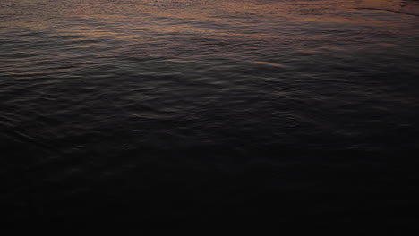 sunset,-purple-sky,-dark-waters-of-the-sea,-dock-of-the-bay