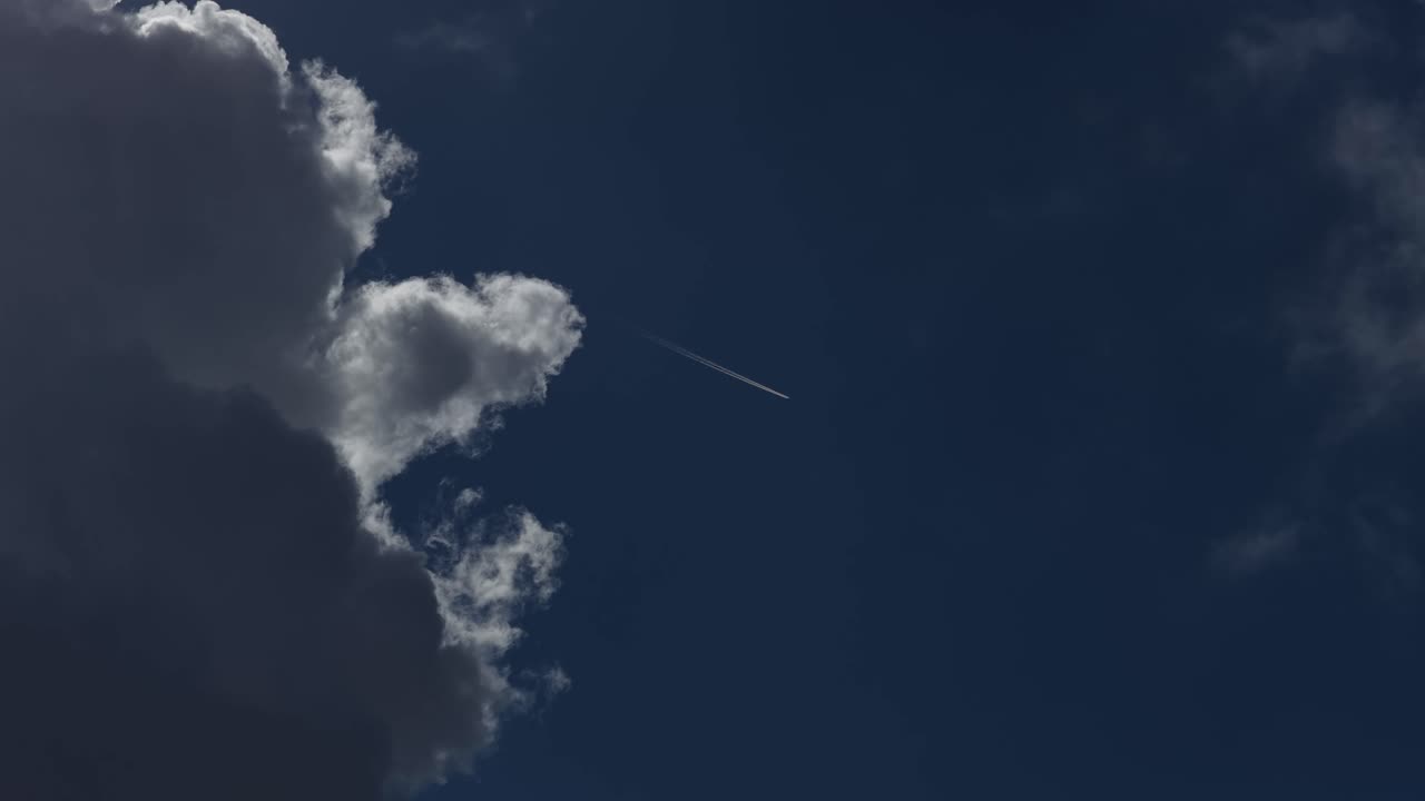 Plane flying in the middle of the clouds
