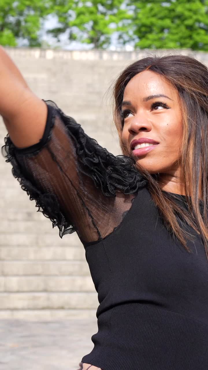 A woman in a black top