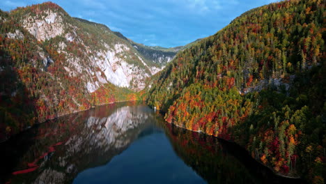 Aerial-drone-view-of-the-lakeshore-of-the-legendary-Lake-Toplitz,-Ausseer-Land-region,-Styria,-Austria