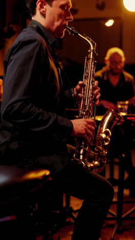 saxophonist performing jazz music in a nightclub