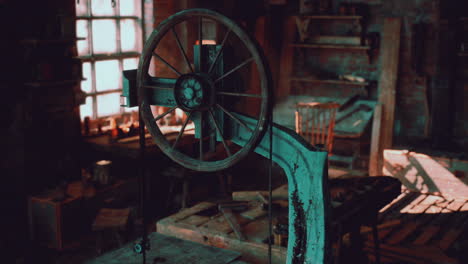 old carpentry workshop with vintage tools and machinery in rustic setting