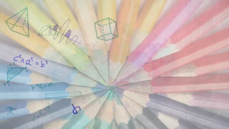 mathematical equations against multiple colored pencils spinning