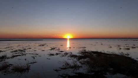 sunset aerial view mobile bay, alabama