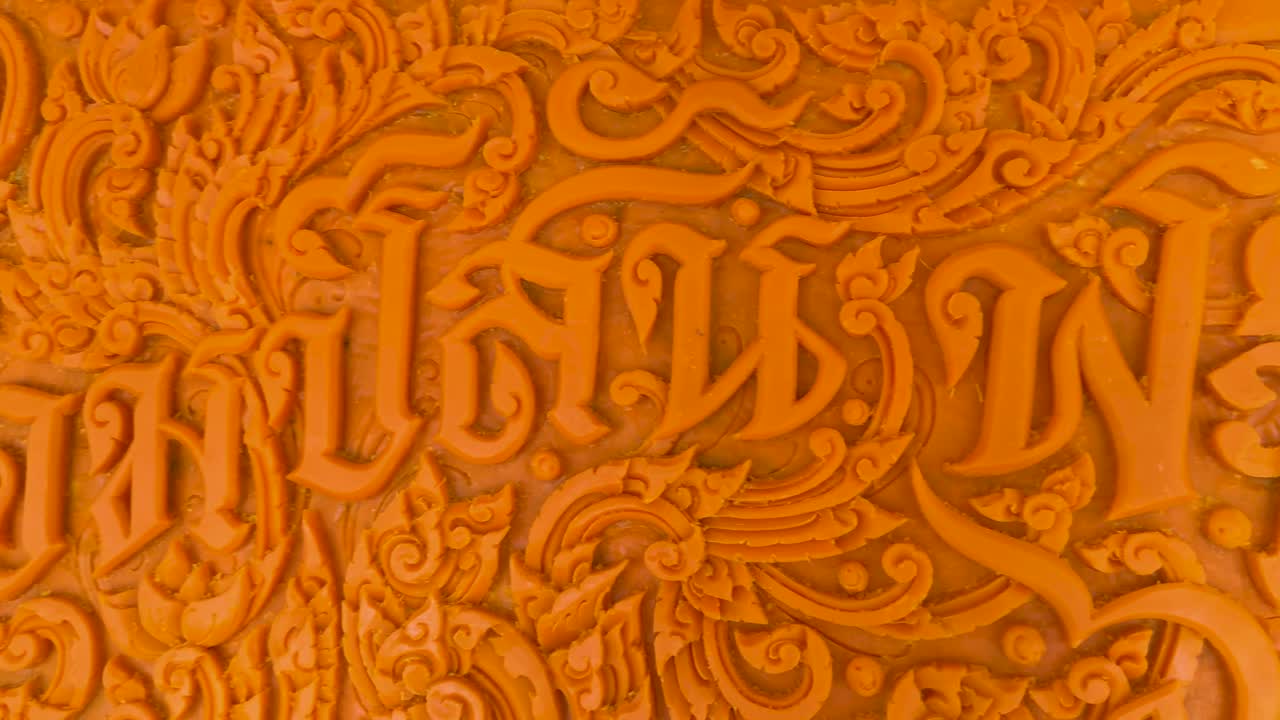 Detailed view of a carved candle design