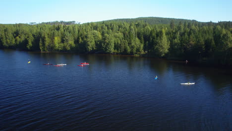 drone footage of a group of people kayaking in a river