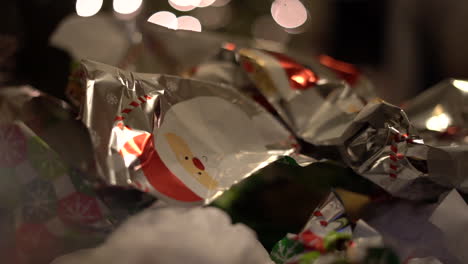 gift wrapping bunched up after opening presents christmas morning - isolated close up