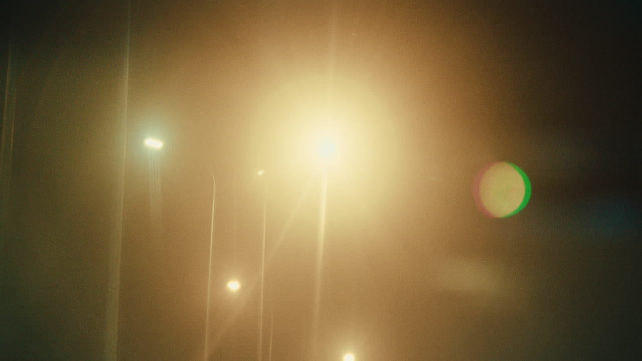 Night City Lights Through Fog