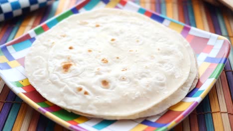 Homemade-roti-chapati-on-table-,