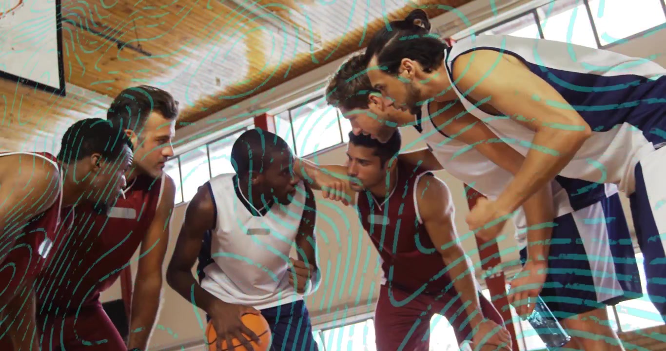 Gathering huddle on court six players dribbling orange basketball exchanging gestures prepping play