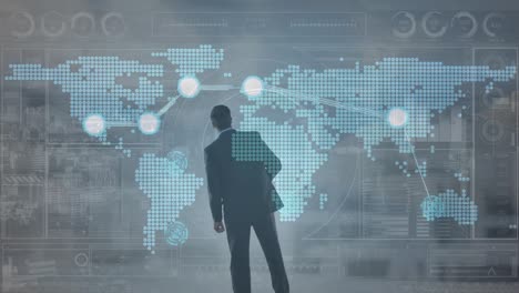 animation of globe and data processing over businesses man and map