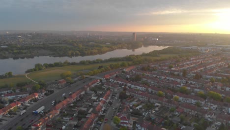 Sunrise-over-UK-Motorway,-London,-Brent---Aerial-shot-,Dolly-In