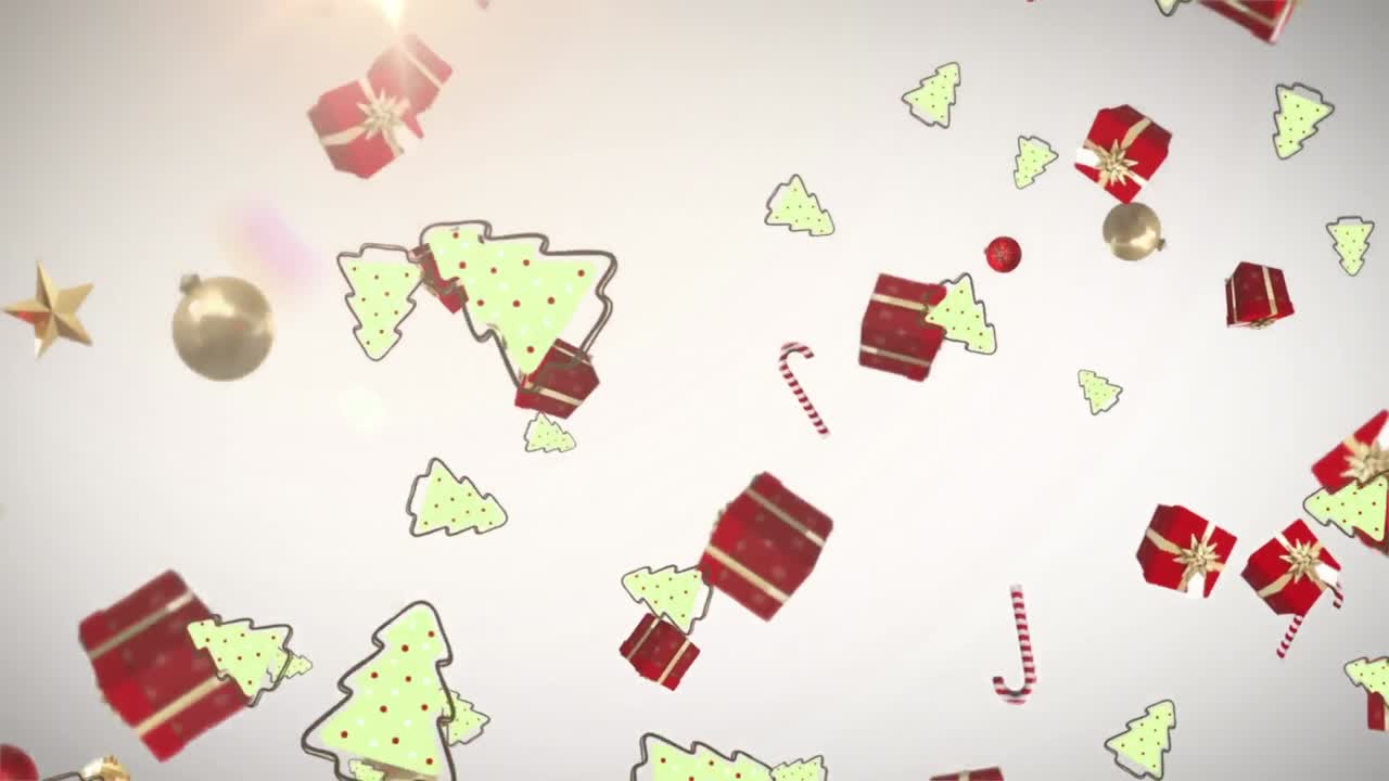 múltiples iconos de concepto de navidad cayendo contra el punto de luz sobre un fondo gris