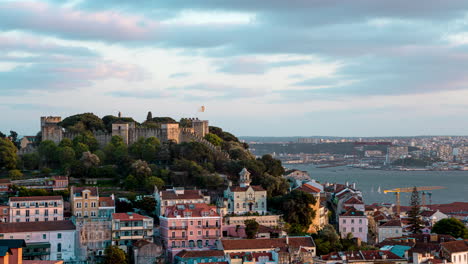 Time-lapse-of-the-sun-setting-over-Lisbon,-Portugal-as-a-storm-rolls-in-with-dark-clouds-overhead