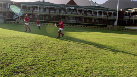 male rugby players playing rugby in the stadium 4k