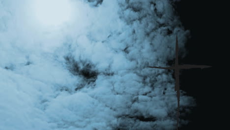 animation of clouds forming against dark sky, cross silhouette on right side