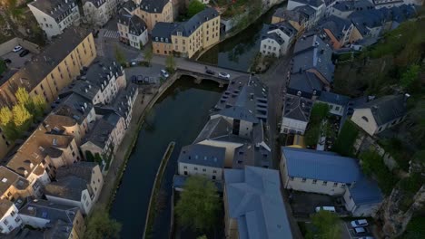 drone shot of pont du grund in luxembourg city early in the morning