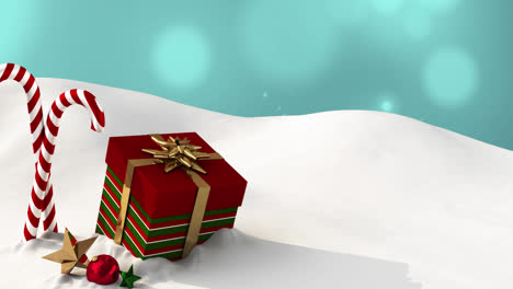 animación de regalos y dulces de navidad que se encuentran en la nieve con luces azules cayendo en el fondo