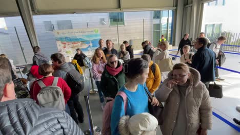 long queue at airport passport control