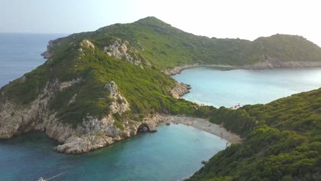 porto timoni bay corfu, sun sea and sand greek island holiday aerial flyover