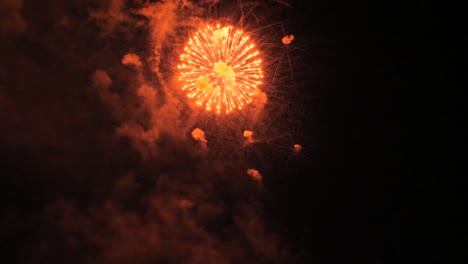 red balls fireworks, slow motion