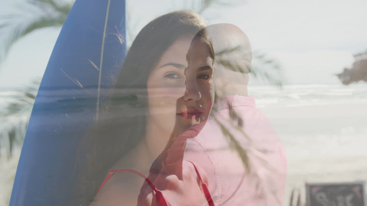 Beach couple designing marketing on sandy beach, overlaying animated surfboard graph and wave icons