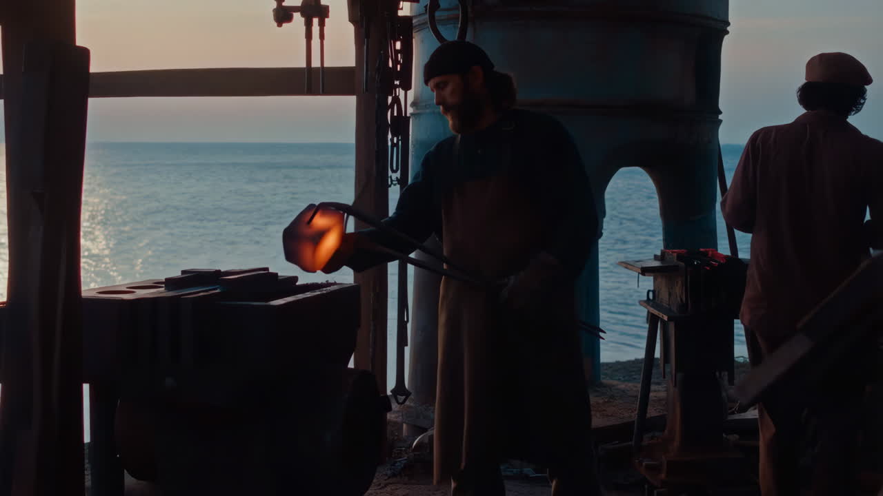 Blacksmith Forging Hot Metal at Sunset by the Sea
