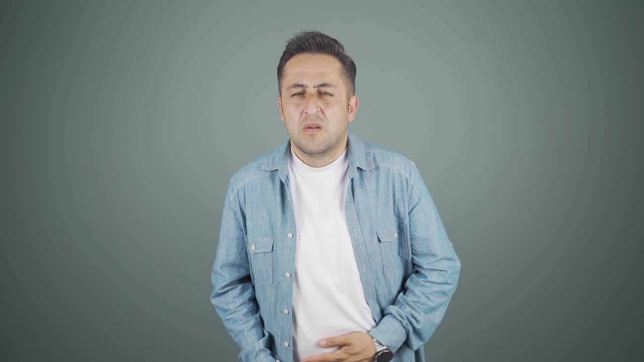 Man experiencing stomachache.