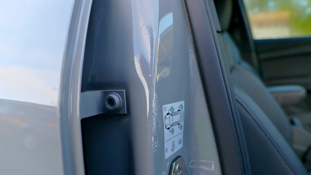 Paint on SUV car door shut - close up - pedestal top to bottom