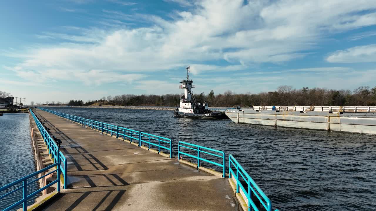 A tug boat as seen from the channel's boardwalk